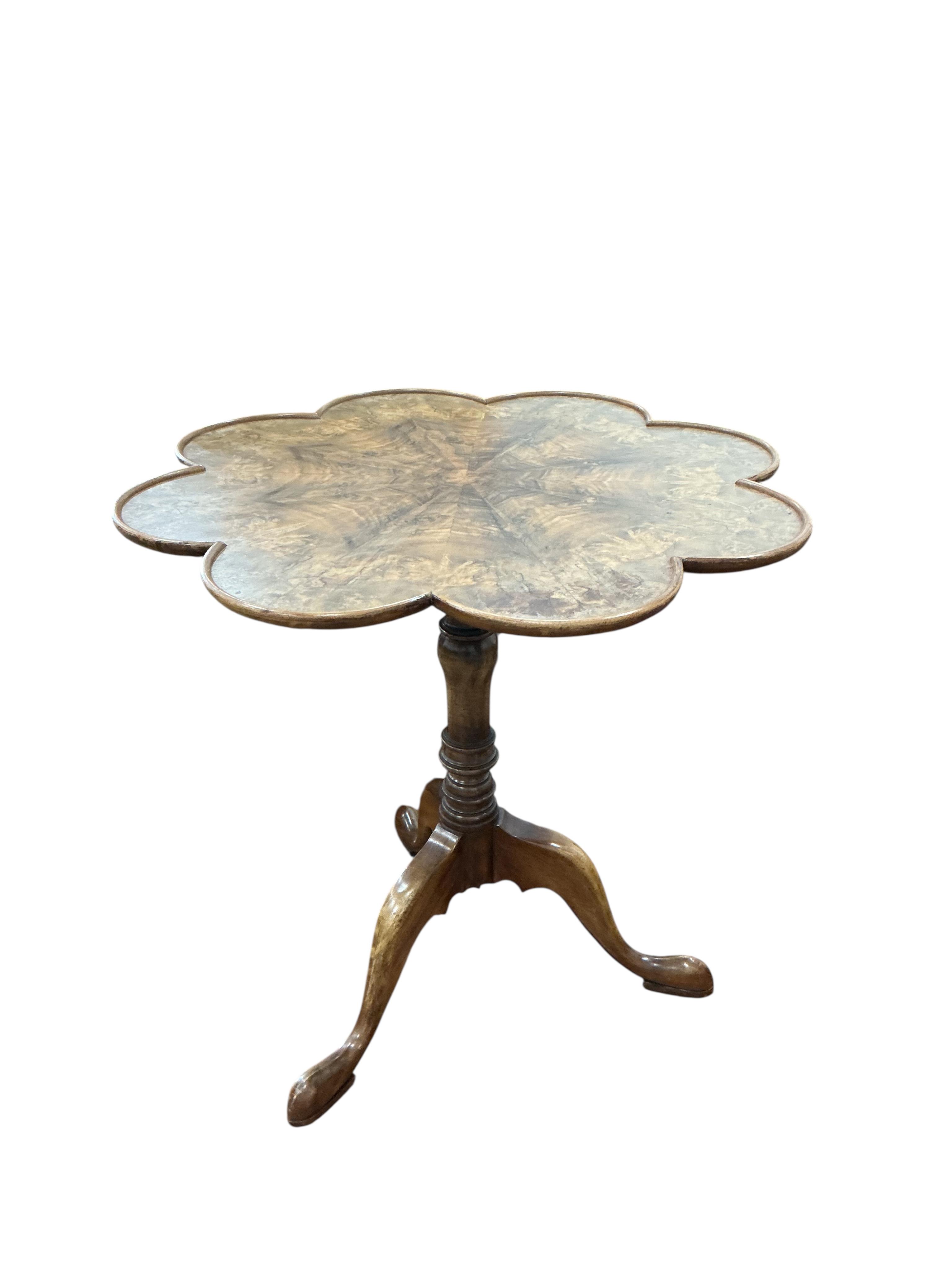 A reproduction mahogany tilt top tripod tea table, diameter 67cm, height 66cm